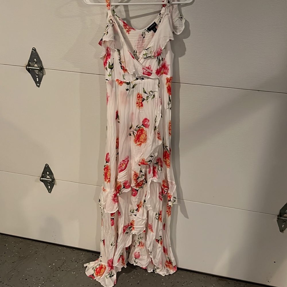 Size 00 plus size white Torrid dress-it’s long and beautiful.
